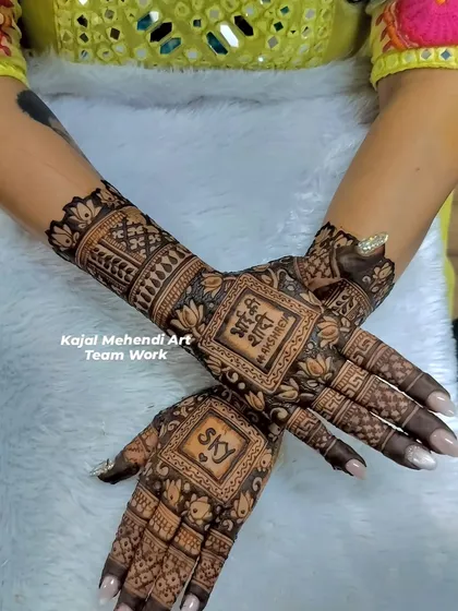 For large wedding parties, my team and I work together to create beautiful, coordinated designs. Here, we personalized the mehndi for the groom's family with the phrase 'Bhai ki Shaadi' right in the center.