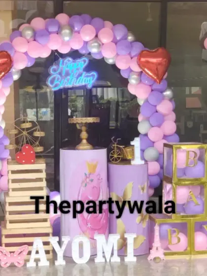 A sweet princess theme for a first birthday, using a pastel purple and pink color palette. I included heart-shaped foil balloons and princess cutouts to make it extra special for the little one.