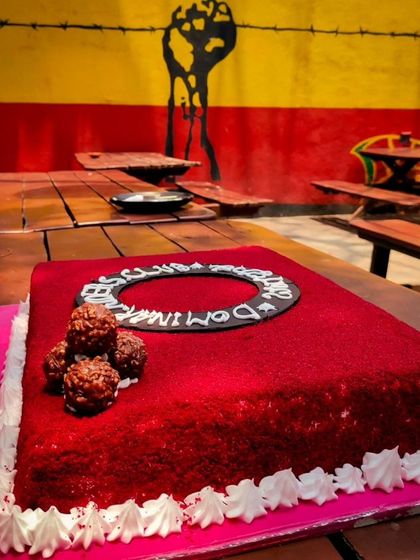 A close-up of our 5th-anniversary cake at Rasta Cafe. A special moment for our riding club.