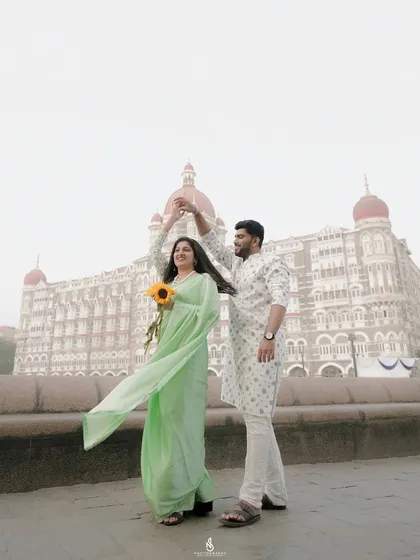 A classic cinematic pose in front of the iconic Taj Mahal Palace Hotel in Mumbai. Even in bustling city locations, we can create timeless, romantic images that feel like a scene from a movie.