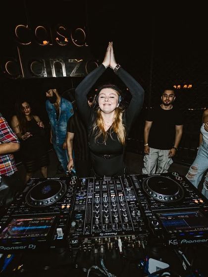 A moment of gratitude and connection with the crowd at Casa Danza. Ending a set with my hands up in a 'namaste' is my way of thanking everyone for sharing their energy.