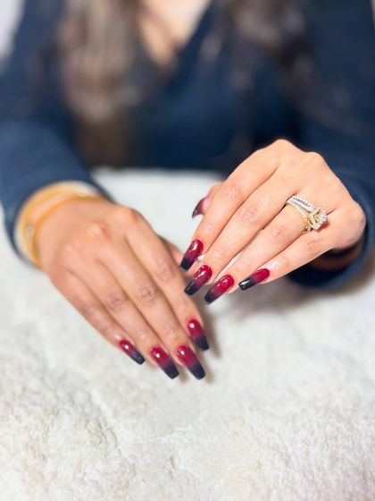 A square-tipped version of the dramatic black and red ombre. This shows how the same color scheme can look different depending on the nail shape.
