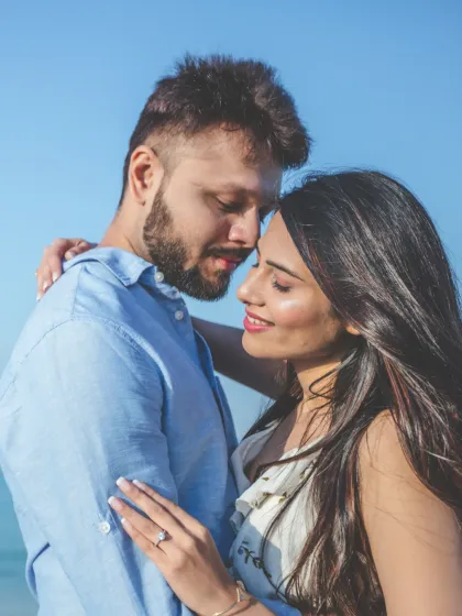 An intimate close-up capturing the couple's connection against the beautiful backdrop of the Dubai seaside. A perfect blend of emotion and location.