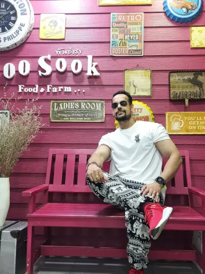 Enjoying the unique atmosphere at 1,000 Sook Food and Farm in Thailand. It's fun to explore new places and cultures.