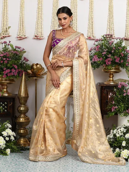 Another view of this stunning saree, perfect for a daytime wedding or festive brunch.
