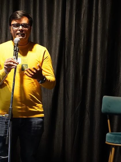 A speaker passionately makes a point during his time on stage. Whether it's comedy, a talk, or a story, our platform is open for sharing ideas and perspectives.