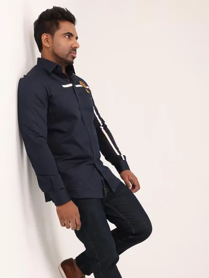 A side profile shot showing how the stripe detail continues down the arm, creating a cohesive and thoughtful design. This custom shirt is perfect for a sharp, polished look.