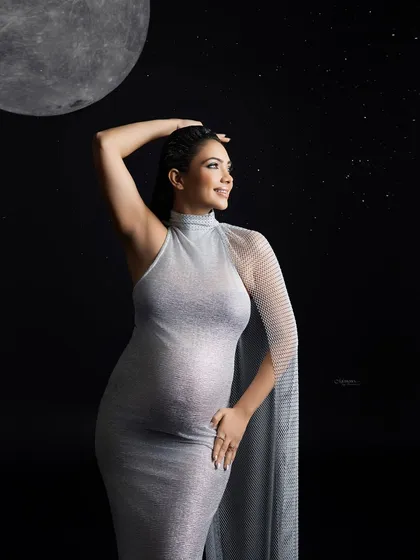 A closer look at our celestial maternity session. I angled the lights to make it look like moonlight was hugging her baby bump, creating a natural, otherworldly glow.