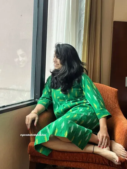 My green Ikat dress-cum-kurta, seen here in a quiet moment. It’s a bestseller because it’s so easy to style as a dress or with pants, making it a true wardrobe staple.