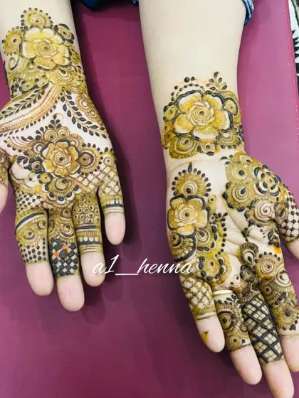 A lovely semi-bridal design with bold floral work and delicate shading. This shows how my organic henna can be used for both thick and thin lines in the same design.
