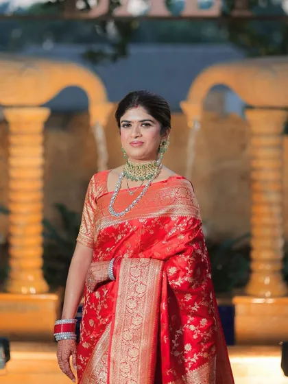 A close-up of the bride, her makeup looking flawless. The subtle look enhances her natural grace and confidence.