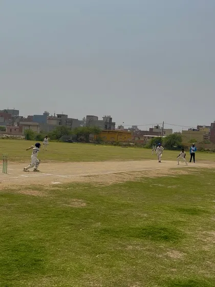A young batsman running for a quick single during the final match.