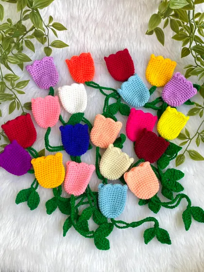 Another view of the beautiful, multi-colored tulip keychains, spread out to show all the different shades.