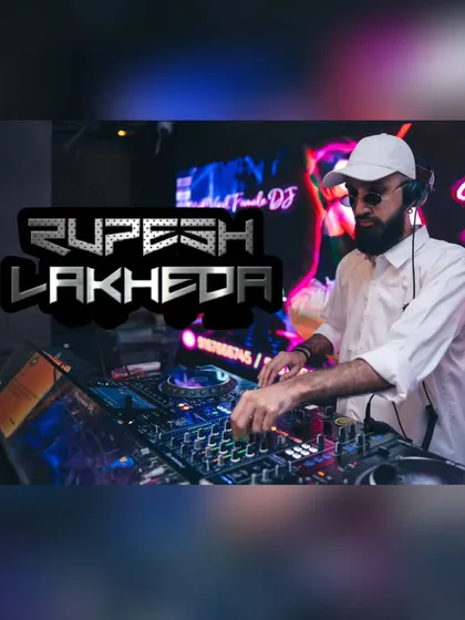 A clear shot of me in my element, mixing tracks at a club event. I use a professional Pioneer DJ console to ensure seamless transitions and high-quality sound for every performance, whether it's for a club residency or a private sangeet night.