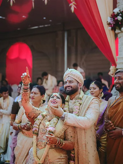 Capturing pure joy. I love seeing my clients so happy in the outfits we created together. This candid moment shows off the beautiful texture and fall of their custom South Indian wedding attire.