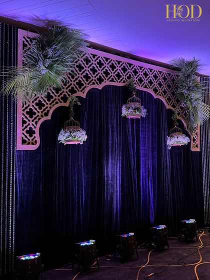 The full musician's stage, a perfect blend of traditional architecture and moody, dramatic lighting for an evening of entertainment.