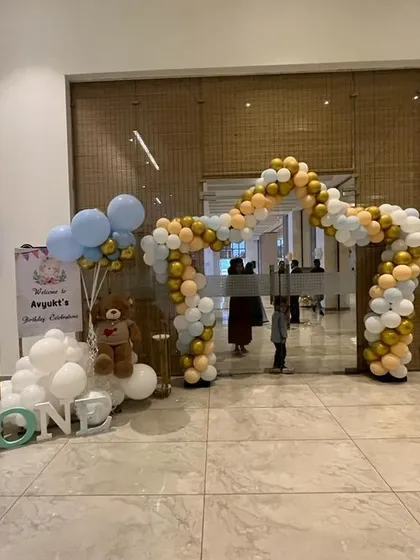 Your party's grand impression starts at the entrance. I built this beautiful balloon arch and welcome area for a first birthday, setting a celebratory tone from the moment guests arrived.