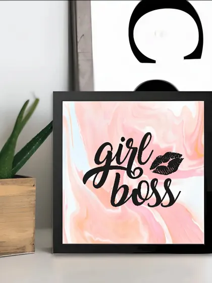 For the entrepreneur in your life. This "girl boss" frame with its stylish pink marble background is the perfect decor piece for a home office.