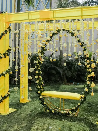 A beautiful floral swing, perfect for the bride to sit on during the Haldi ceremony and a great photo opportunity for guests.