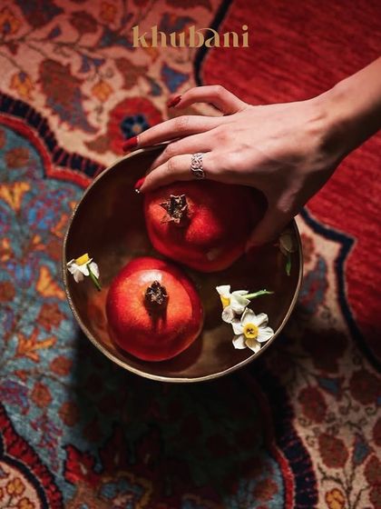 Sufi music isn’t just heard, it’s felt. We use symbolic details like pomegranates on a Persian carpet to evoke the deep cultural roots and sensory richness of our Roohani nights.