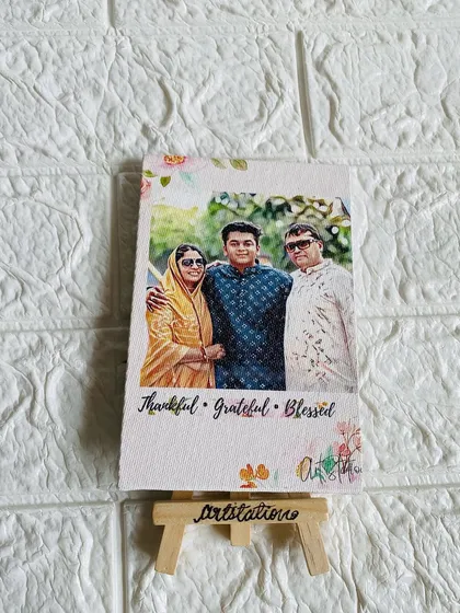 A full view of the illustrated family portrait on a mini canvas. The textured canvas material adds an artistic feel to the print, making it a high quality yet affordable piece of decor.