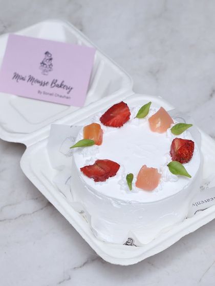 My fresh fruit bento cake is a light and refreshing option. It's decorated with fresh strawberries and other seasonal fruits for a simple yet elegant look.