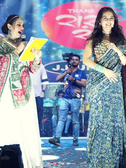 Another angle of me and Tejasswi Prakash on the grand stage at the Raas Rang Thane Navratri event.