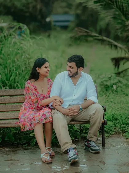A quiet moment shared on a park bench near the sea. Akshata and Sidhant's loving gaze speaks volumes in this simple, beautiful pre-wedding photograph.