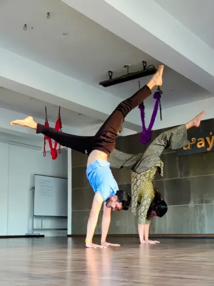 An evening handstand session at Aayana. The dedication of our teachers and students shines through in their practice.