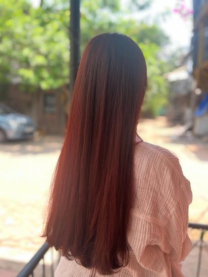 The 'Cherry Red' global color seen in natural outdoor light. It looks incredibly vibrant and shiny.