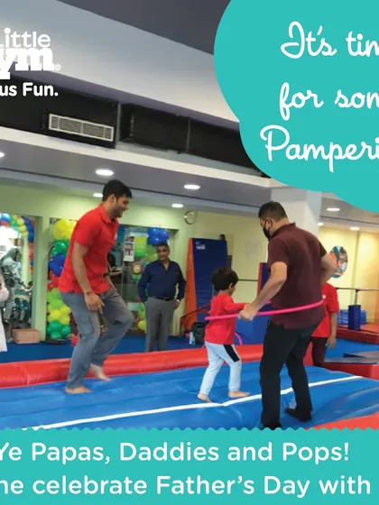 We love celebrating our amazing parents too. Here, a father and son have a blast with a hula hoop during our special Father's Day event, a day dedicated to fun, bonding, and making memories together.