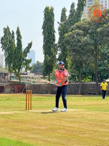 A batsman stands ready at the crease, anticipating the next delivery in a PPL game.