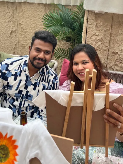 Another happy couple painting together at a baby shower. The easels and supplies I provide make it easy for anyone to create.