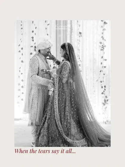 "When the tears say it all." An emotional black and white photo of the couple, capturing a moment of overwhelming love and happiness.