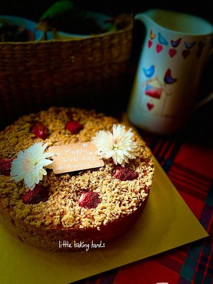A beautiful vanilla strawberry lime cake with a crumble topping. The combination of sweet, tart, and crunchy is just perfect.