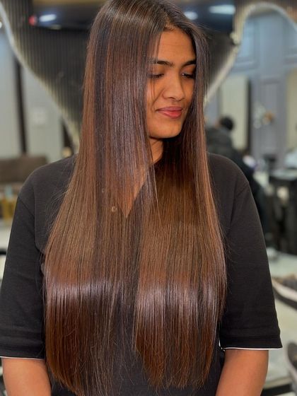 This client is so happy with her new healthy, shiny hair. A good color and treatment can make all the difference.