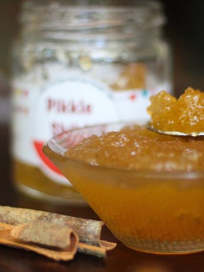 A close look at the wonderful texture of our Apple Cinnamon Jam. You can see the real fruit pieces, cooked down with cinnamon sticks for a warm, aromatic spread.