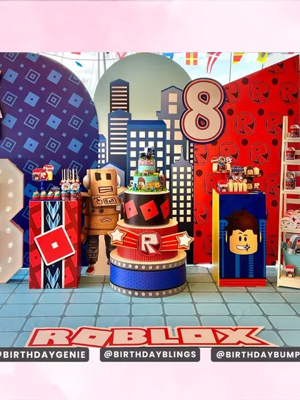 An elaborate Roblox-themed party for an 8th birthday. The setup includes a city-themed backdrop, multiple character cutouts, themed plinths for desserts, and a large light-up number '8'.