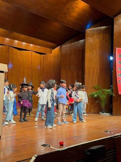 A group of young witches and wizards cast a spell on the audience in this magical performance.
