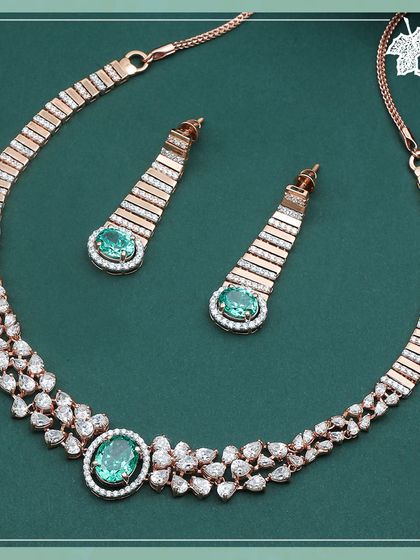 The complete Emerald Glow set, a luxurious combination of vibrant emeralds and brilliant diamonds.