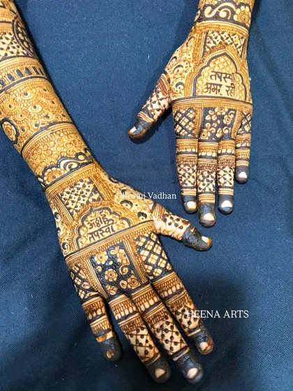 A stunning back-hand design with personalized text. My team and I can create custom designs for the entire bridal party.