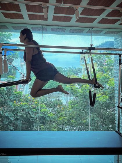 You never get the same chance again. This client is seizing the opportunity to challenge her body with this dynamic pose on the Cadillac.