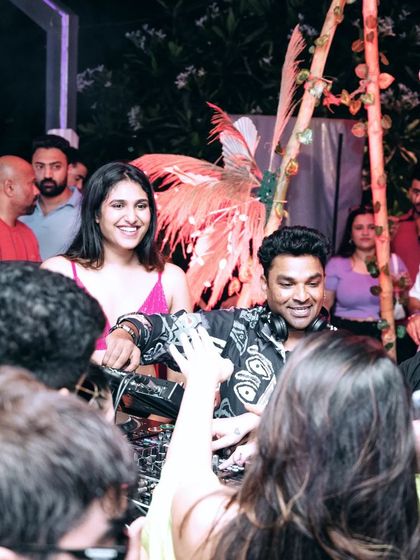 Connecting with the crowd from the DJ booth. Seeing people enjoy the music is the ultimate reward for any DJ.