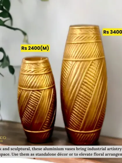 Sleek and sculptural, these aluminum vases bring industrial artistry into your space. Use them as standalone decor or to elevate floral arrangements.