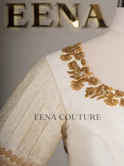 This video showcases an ivory-toned blouse with pleated puff sleeves and gold embroidery. It highlights the intricate handwork and traditional materials that go into every piece I create for my brides.