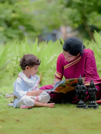 Including family in the shoot creates such warm memories. Here, a mother and son share a quiet moment reading together, surrounded by traditional Vithoba-Rukmini idols. These are the gentle, heartfelt stories I aim to tell.