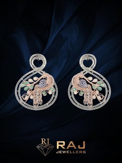 A pair of earring mountings that mirror the elegant peacock design of our signature pendants. The infinity-loop top adds a modern touch to the traditional motif, creating a base for a truly unique pair of earrings.