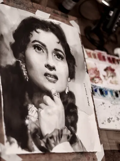 The Madhubala portrait on my easel, capturing a moody, atmospheric shot of the work in the studio.