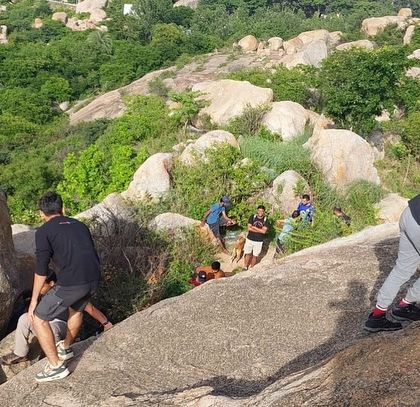 The initial part of the Anthargange trek involves climbing over and around these large volcanic boulders.