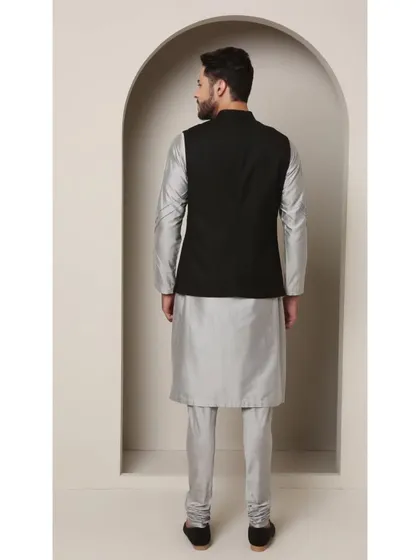 The back view of the Shoorveer bandi set, showcasing the clean tailoring and classic silhouette.